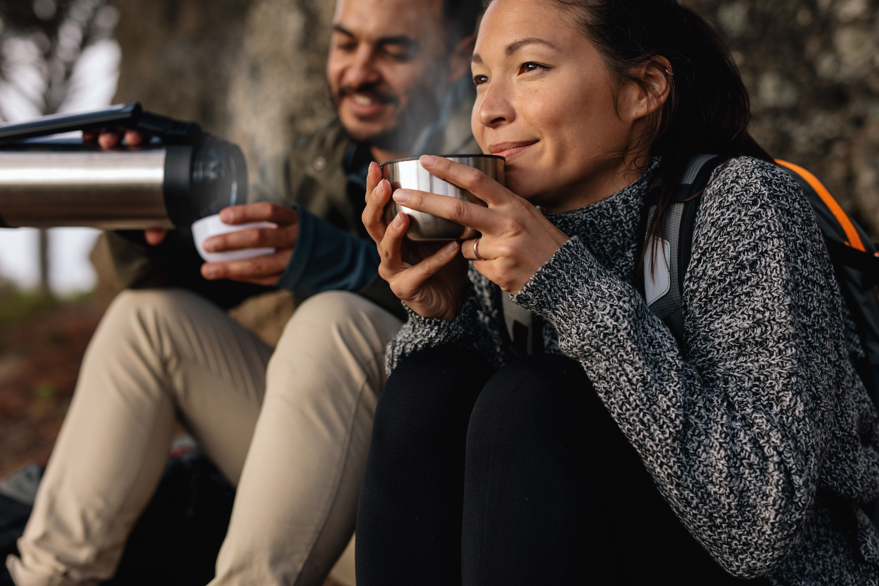 Young Couple Taking a Break on a Hike